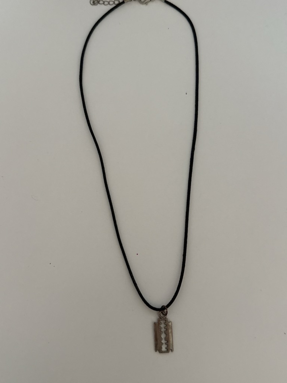 Razor Blade Pendant Necklace on Black Cord